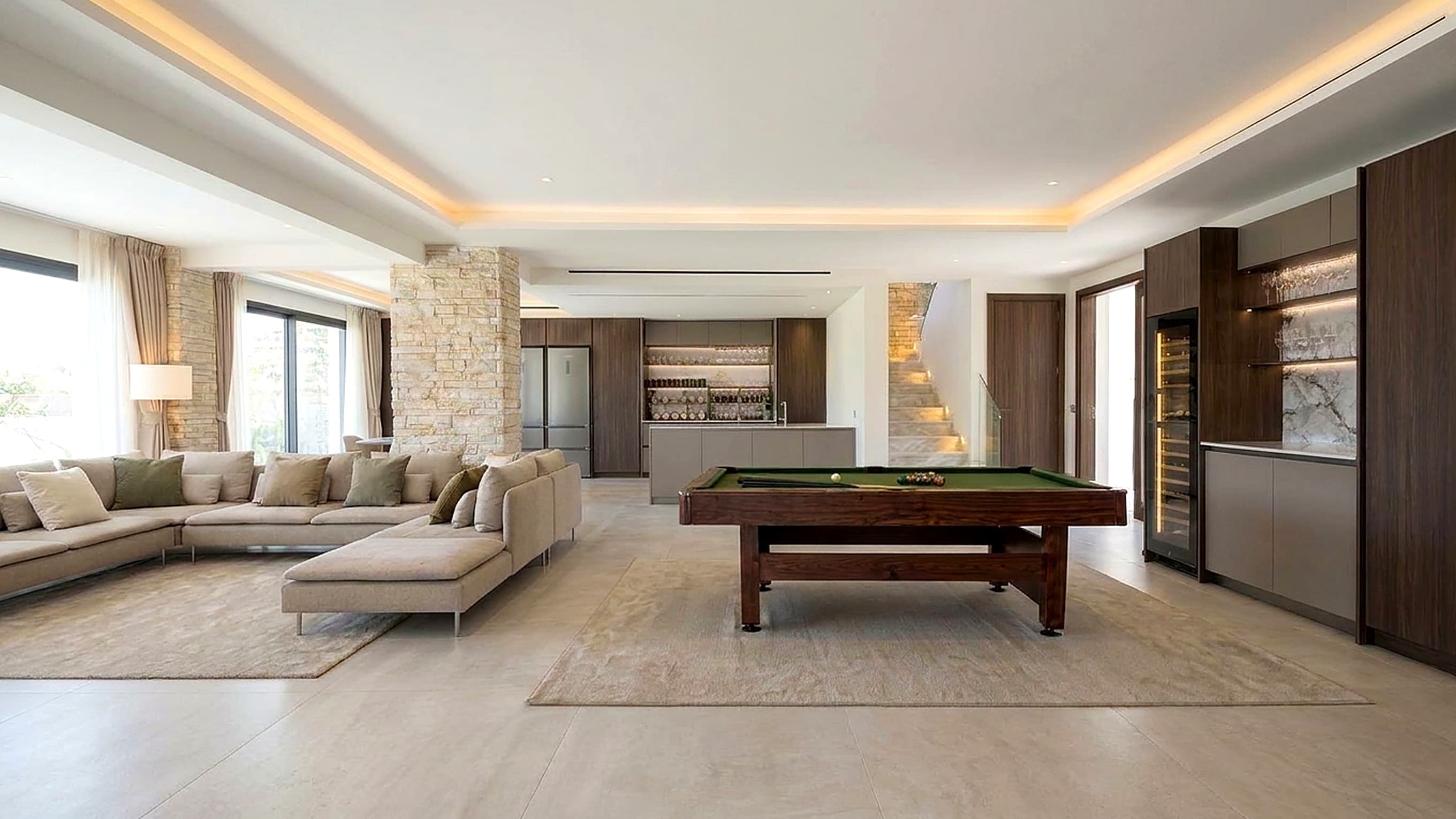 Main hall with lounge, pool table and bar